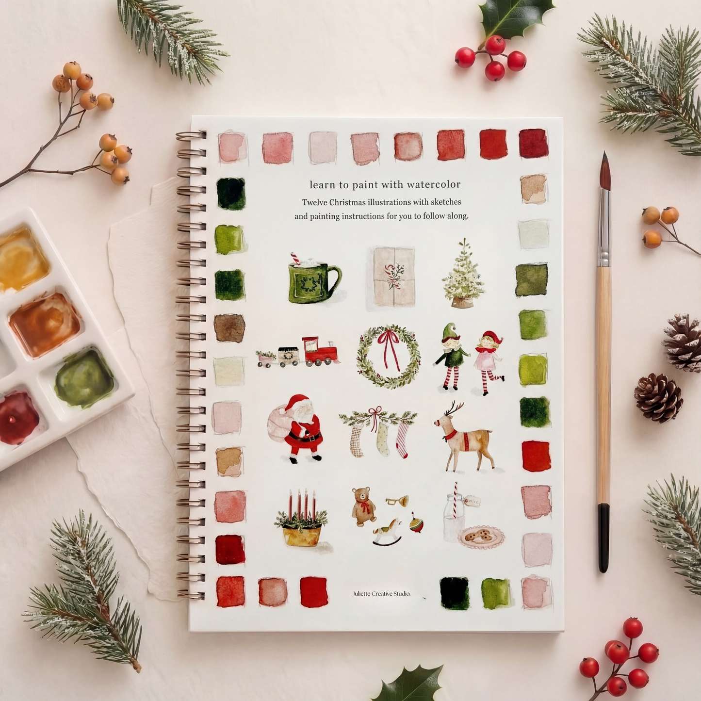Dos du carnet aquarelle Christmas avec motifs Père Noël, renne et décorations de Noël